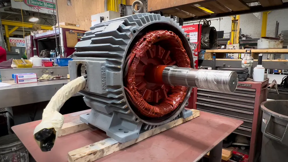 Electric motor with field windings exposed.